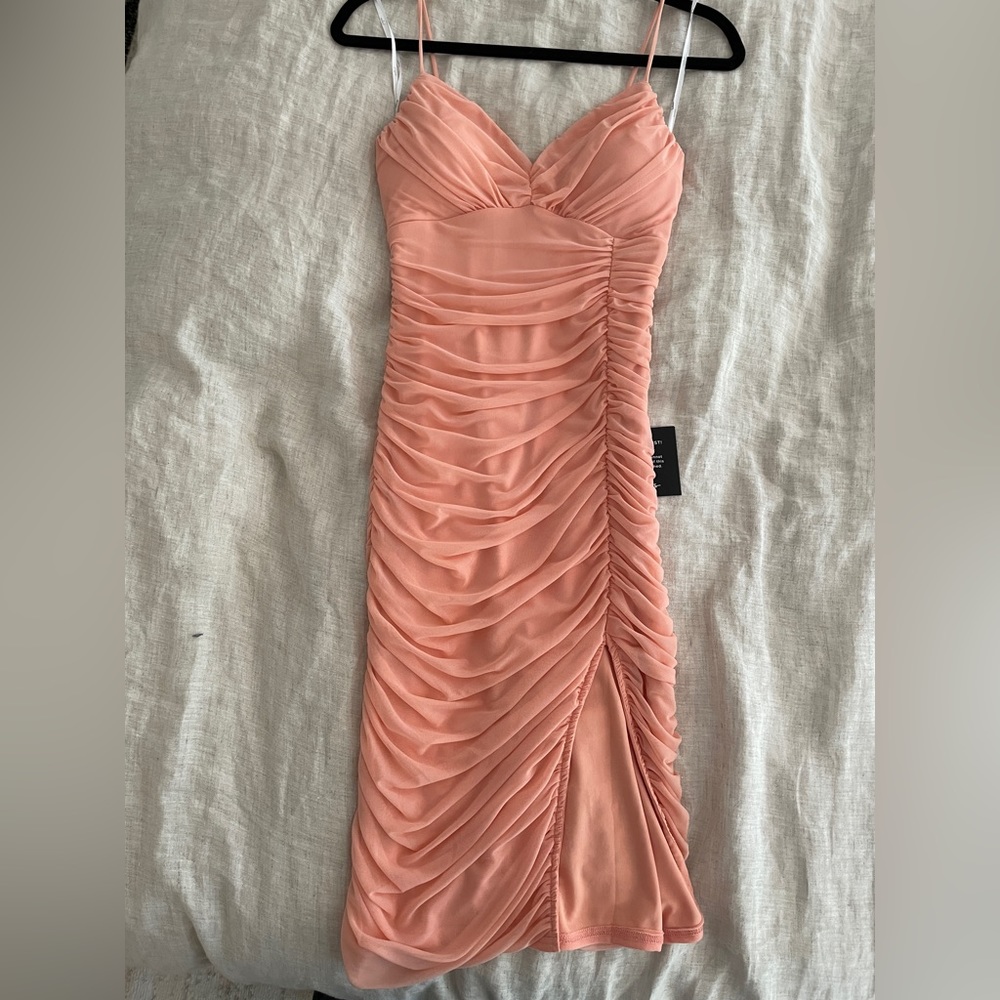 Peach ruched bodycon dress